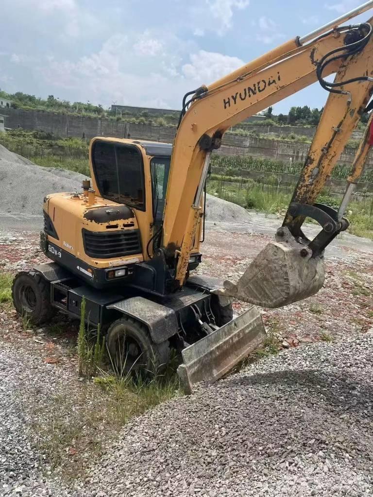 Hyundai 60W-9 Gravemaskiner på hjul