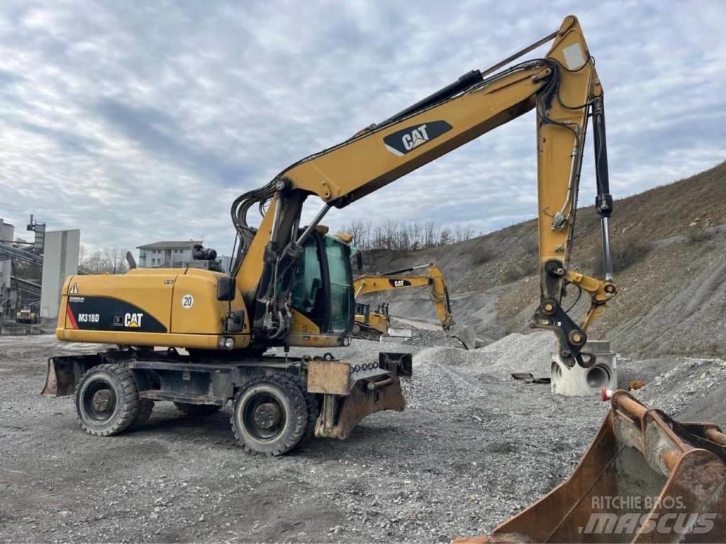 CAT M318D Gravemaskiner på hjul