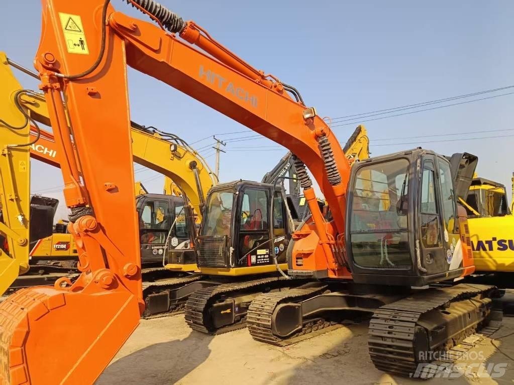 Hitachi ZX135 Gravemaskiner på larvebånd