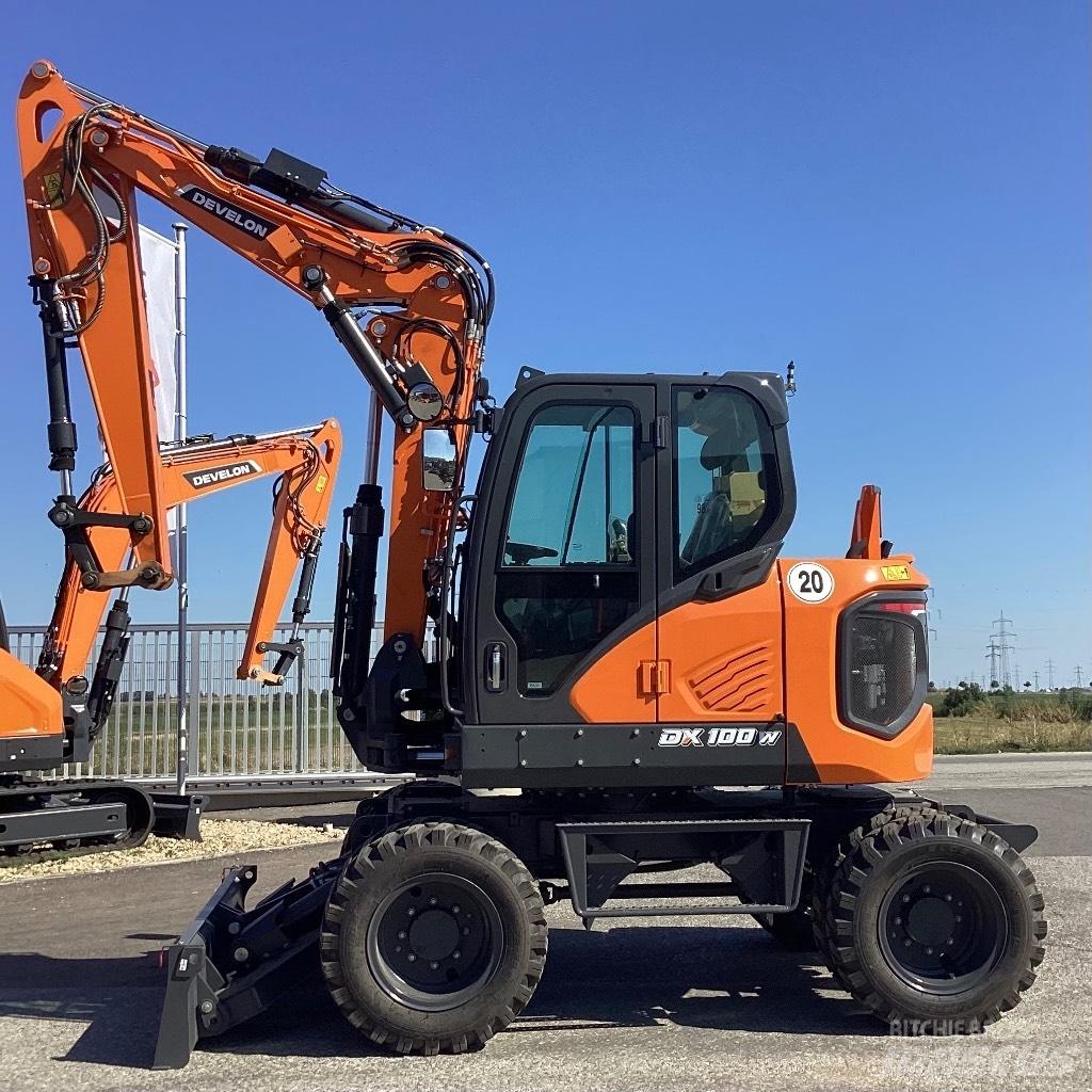 Develon DX100W-7 Gravemaskiner på hjul