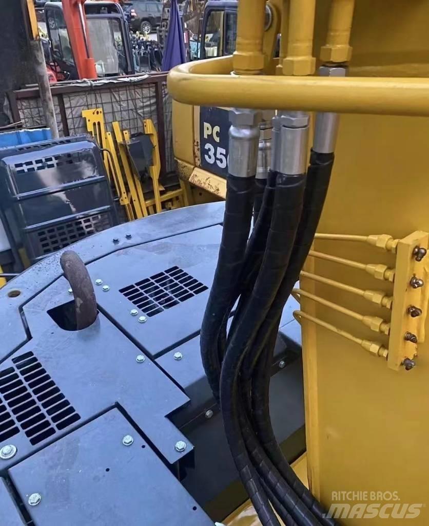 Komatsu 128 US Gravemaskiner på larvebånd