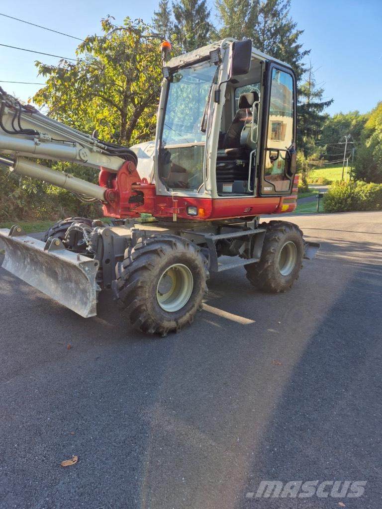 Takeuchi TB 295 W Gravemaskiner på hjul