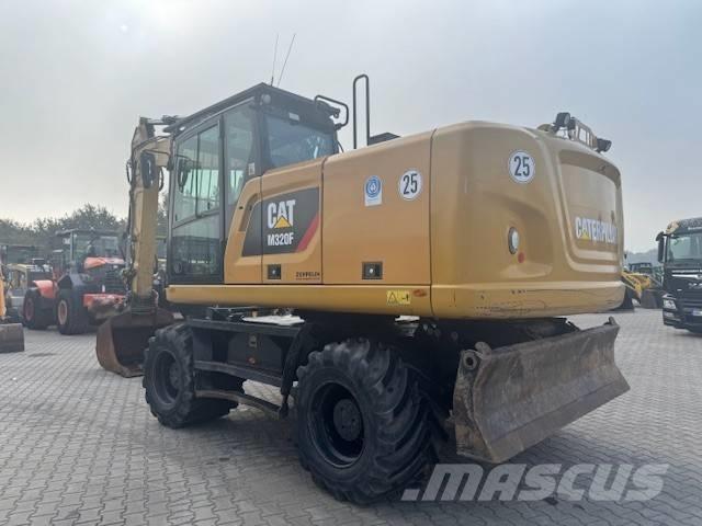 CAT M 320 F Gravemaskiner på hjul