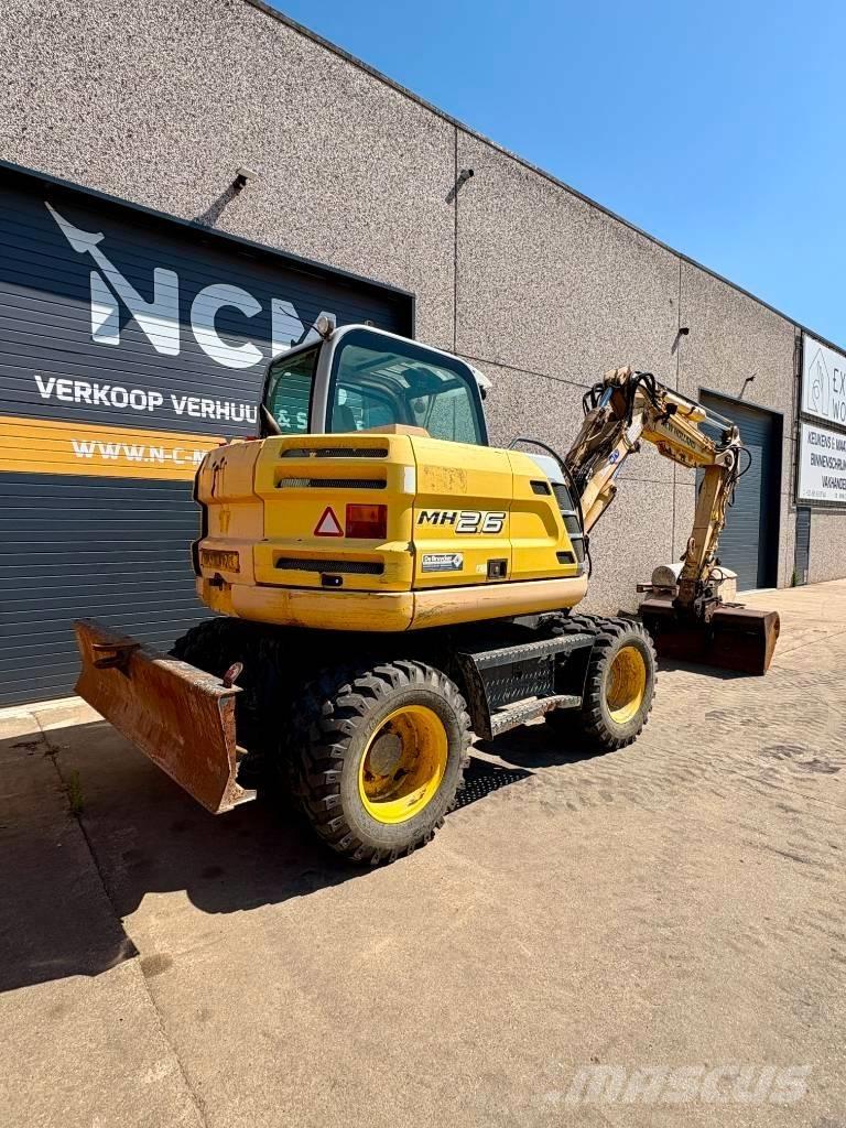 New Holland MH 2.6 Gravemaskiner på hjul