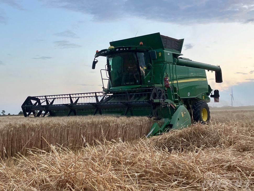 John Deere T 670 i Mejetærskere