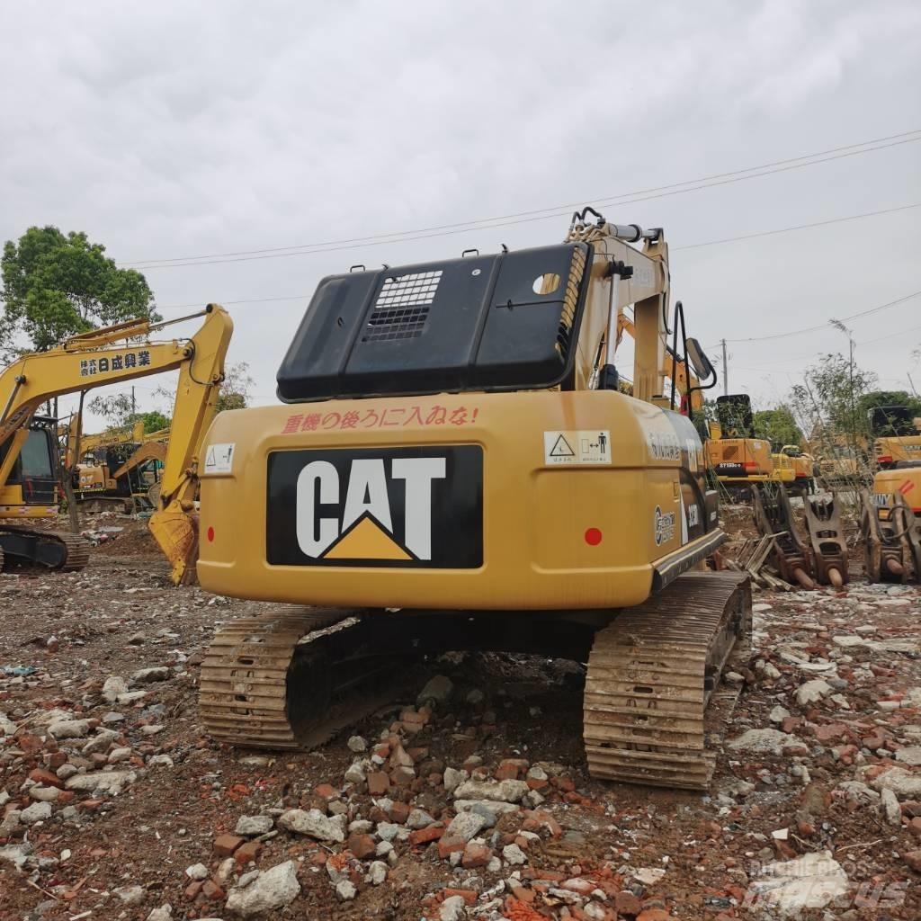 CAT 323DL Gravemaskiner på larvebånd