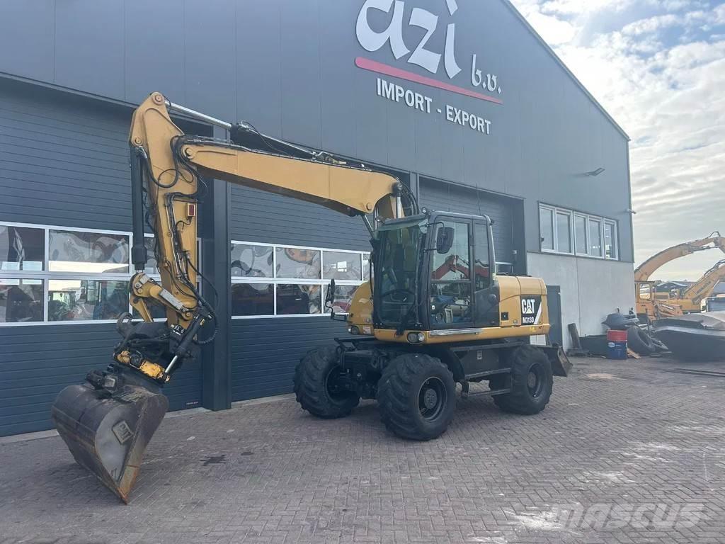 CAT M313D Gravemaskiner på hjul