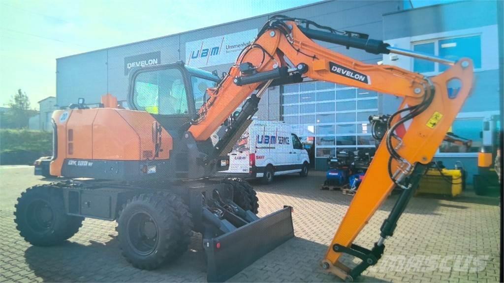 Develon DX100W-7 Gravemaskiner på hjul