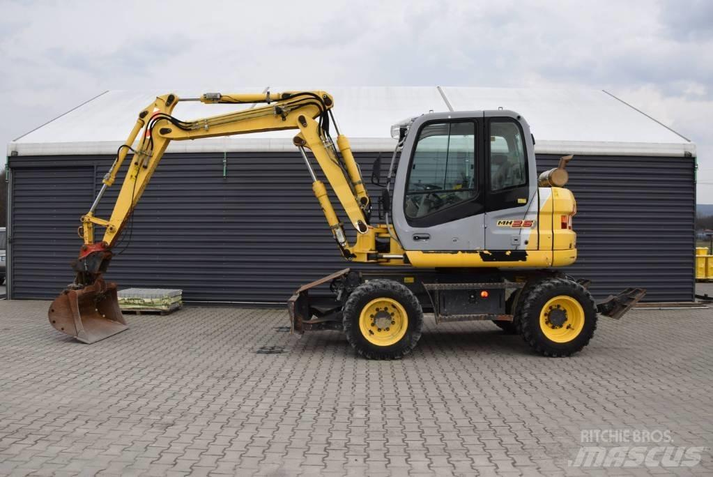 New Holland MH 2.6 Gravemaskiner på hjul