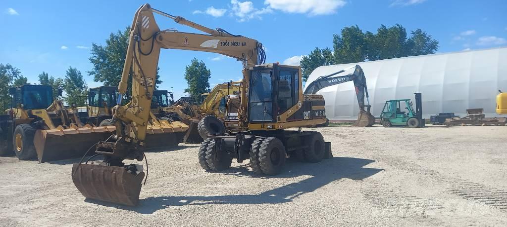 CAT M 315 Gravemaskiner på hjul