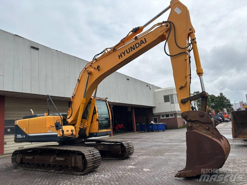 Hyundai 210 Gravemaskiner på larvebånd