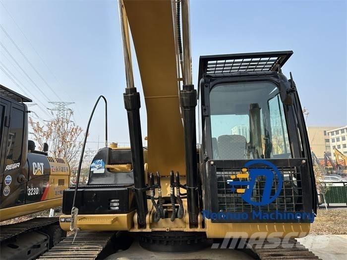 CAT 323D/323/323DL Gravemaskiner på larvebånd