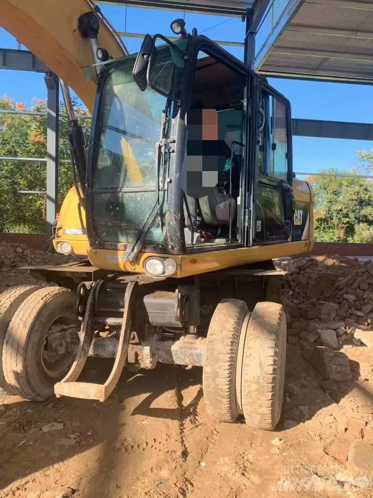 CAT 315 D Gravemaskiner på hjul