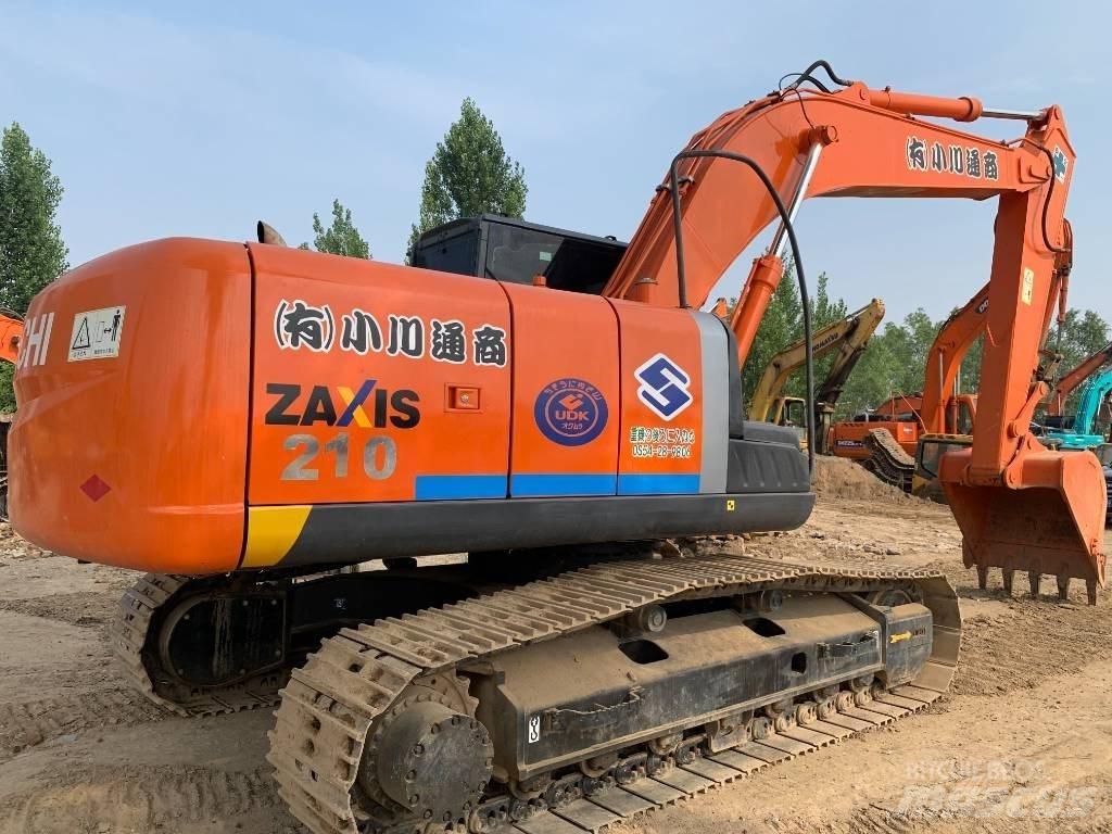 Hitachi ZX210G Gravemaskiner på larvebånd