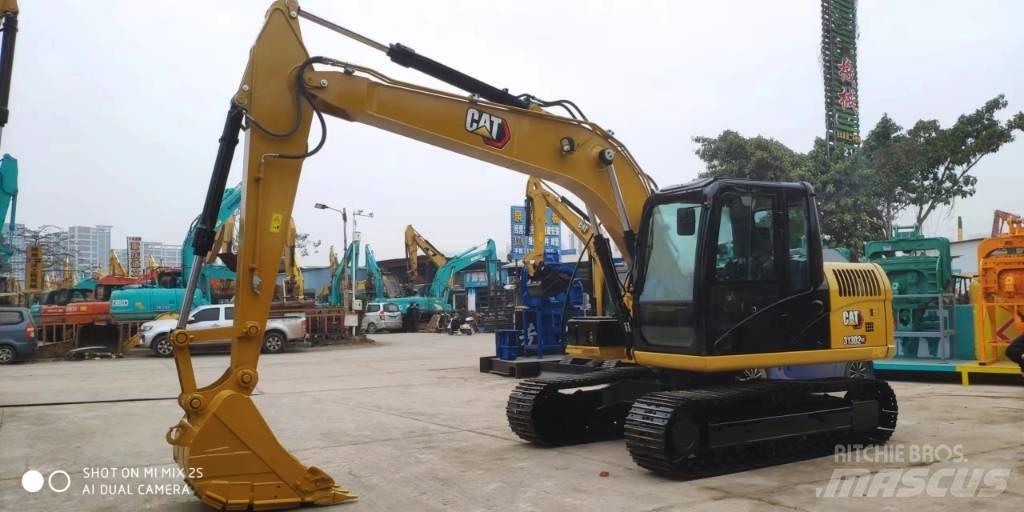 CAT 2021 CAT 313D2GC Gravemaskiner på hjul