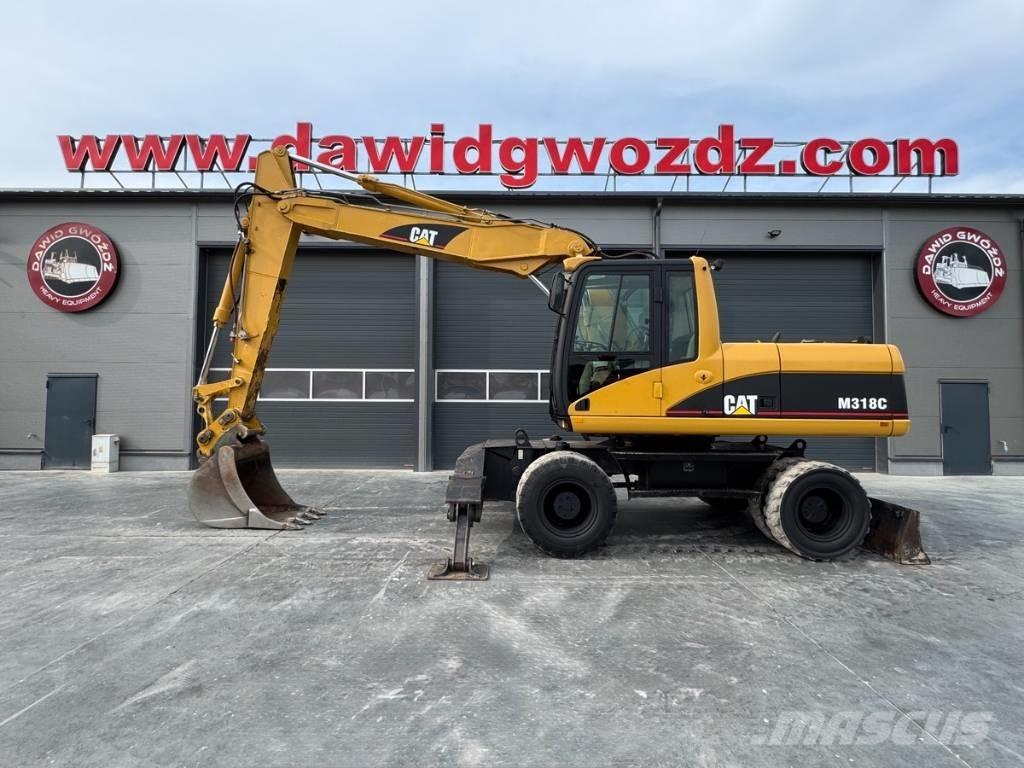 CAT M 318 C Gravemaskiner på hjul
