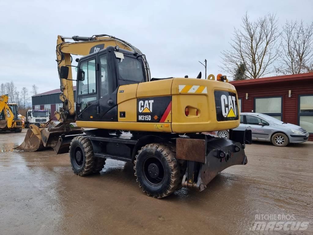 CAT M 315 D II Gravemaskiner på hjul