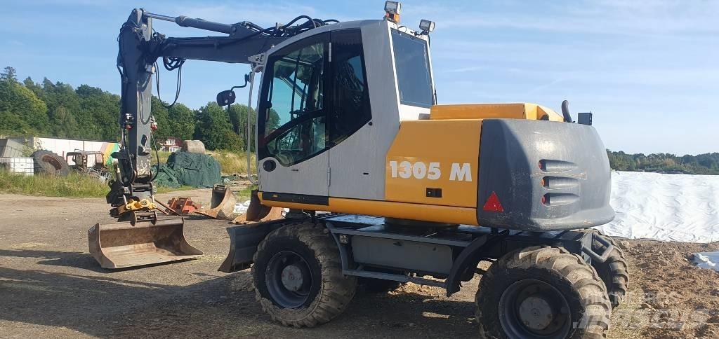 Atlas 1305 M Gravemaskiner på hjul