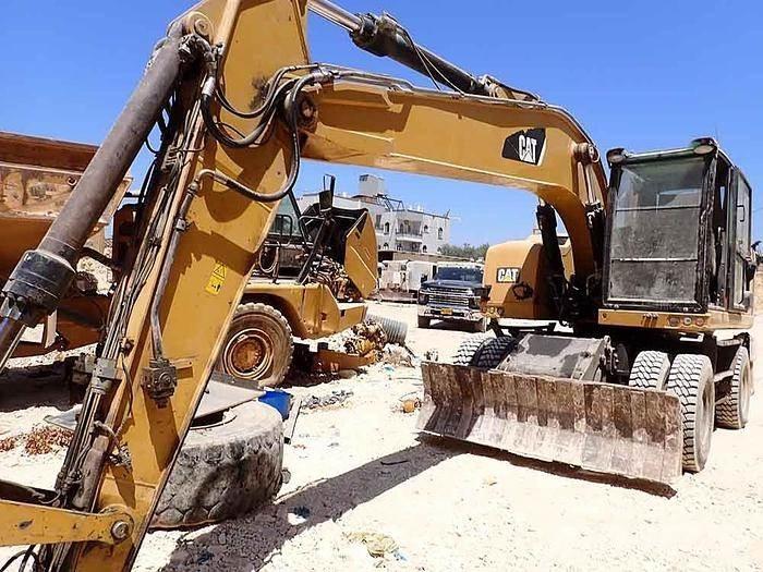 CAT M320F Special gravemaskiner