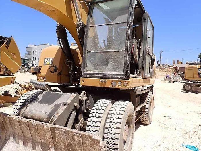 CAT M320F Special gravemaskiner