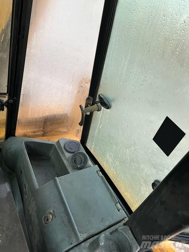 CAT 428D Rendegravere