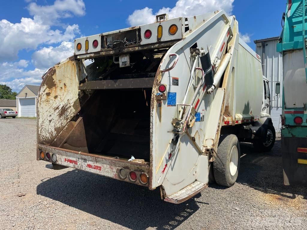 GMC T7500 Renovationslastbiler