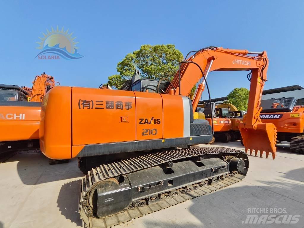 Hitachi ZX 210 Gravemaskiner på larvebånd