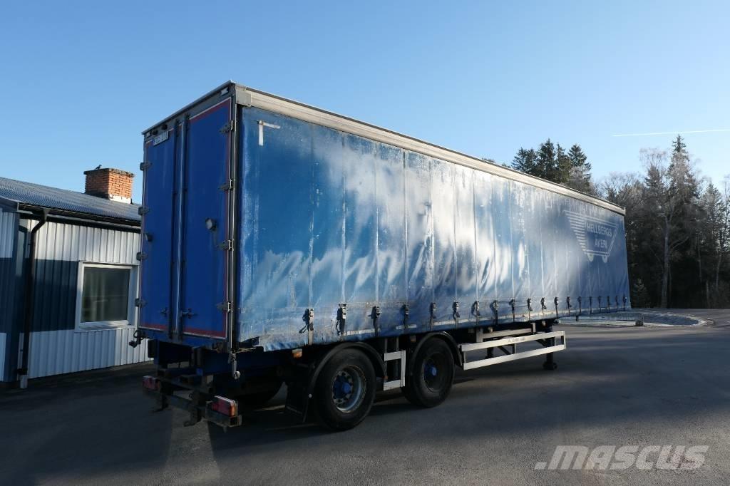 Montracon C2a Semi-trailer med Gardinsider