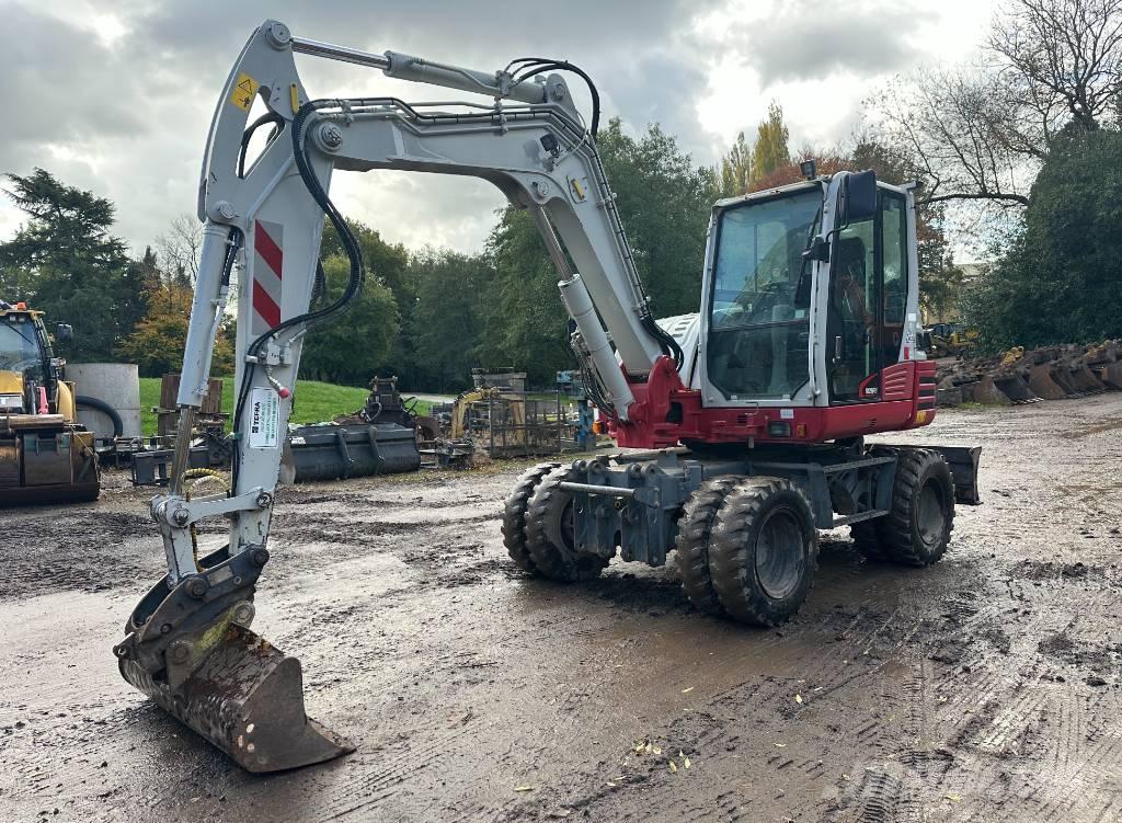 Takeuchi TB 295 W Gravemaskiner på hjul