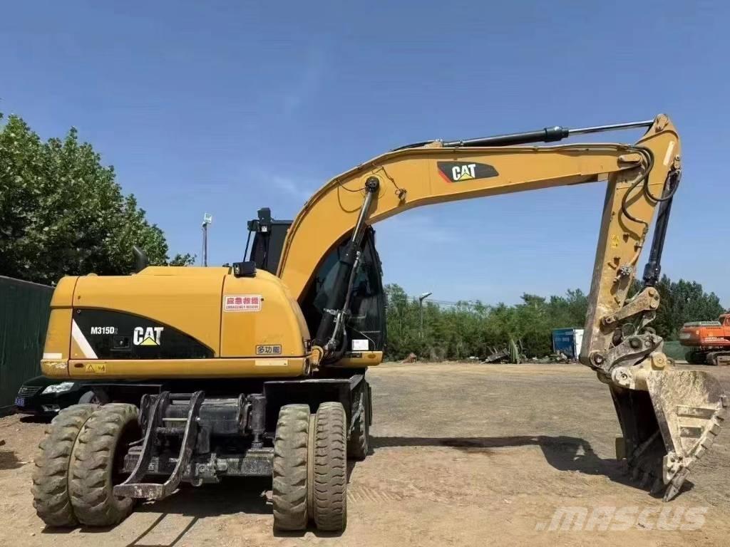 CAT M 315 D Gravemaskiner på hjul
