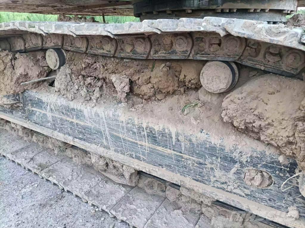 CAT 323GX Amfibiegravemaskine