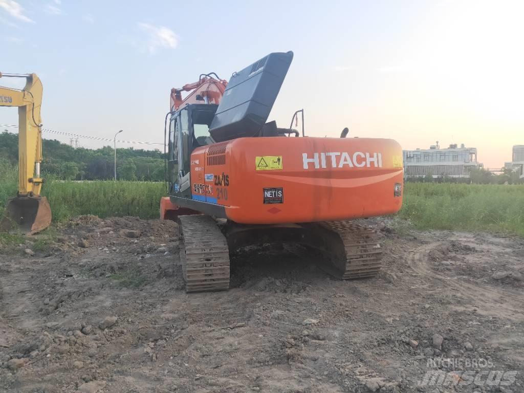 Hitachi ZX 210 Gravemaskiner på larvebånd