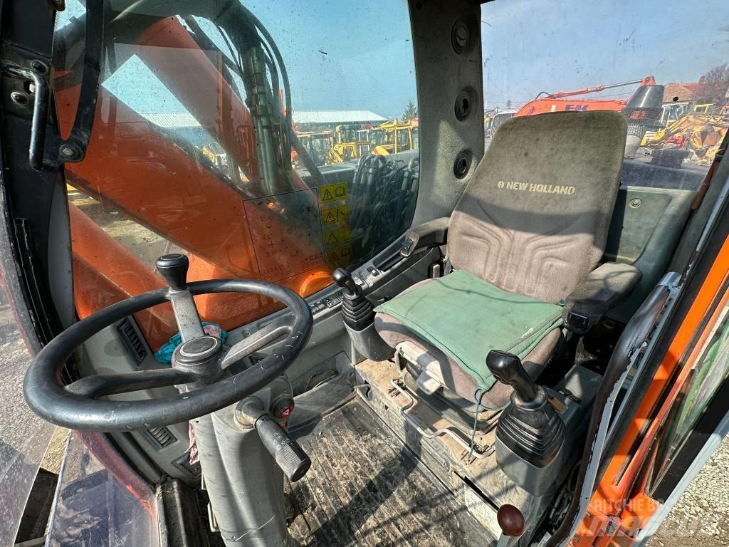 New Holland MH Plus Gravemaskiner på hjul