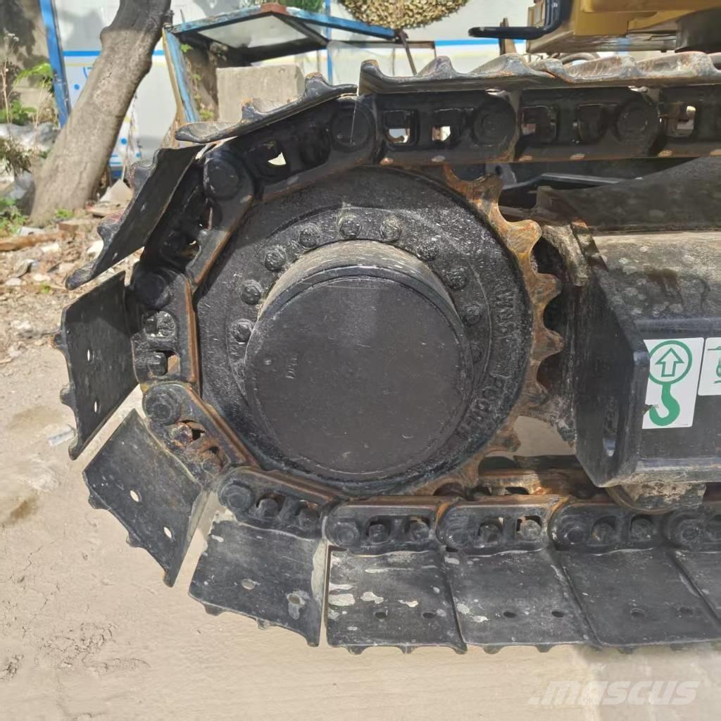 CAT 310 Gravemaskiner på larvebånd