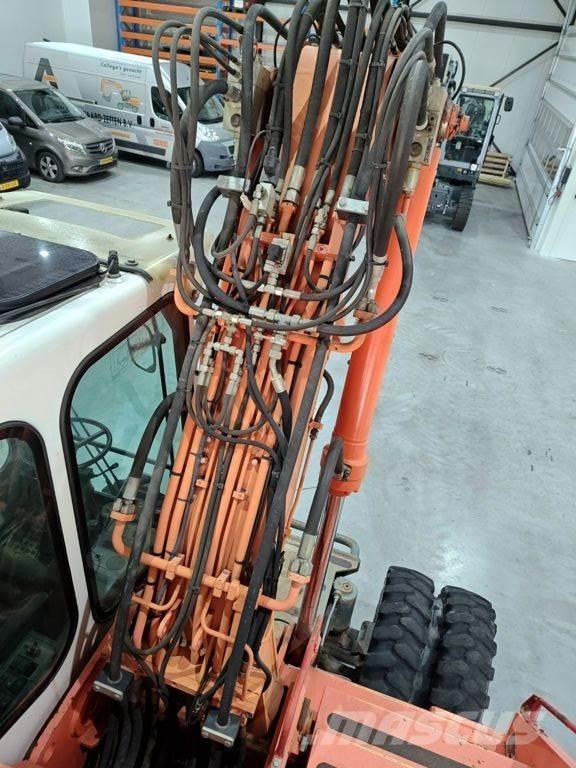 Atlas 1404 Gravemaskiner på hjul