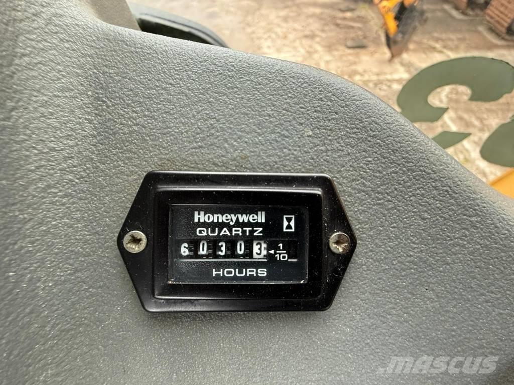 Komatsu WB 93 S-5 Rendegravere