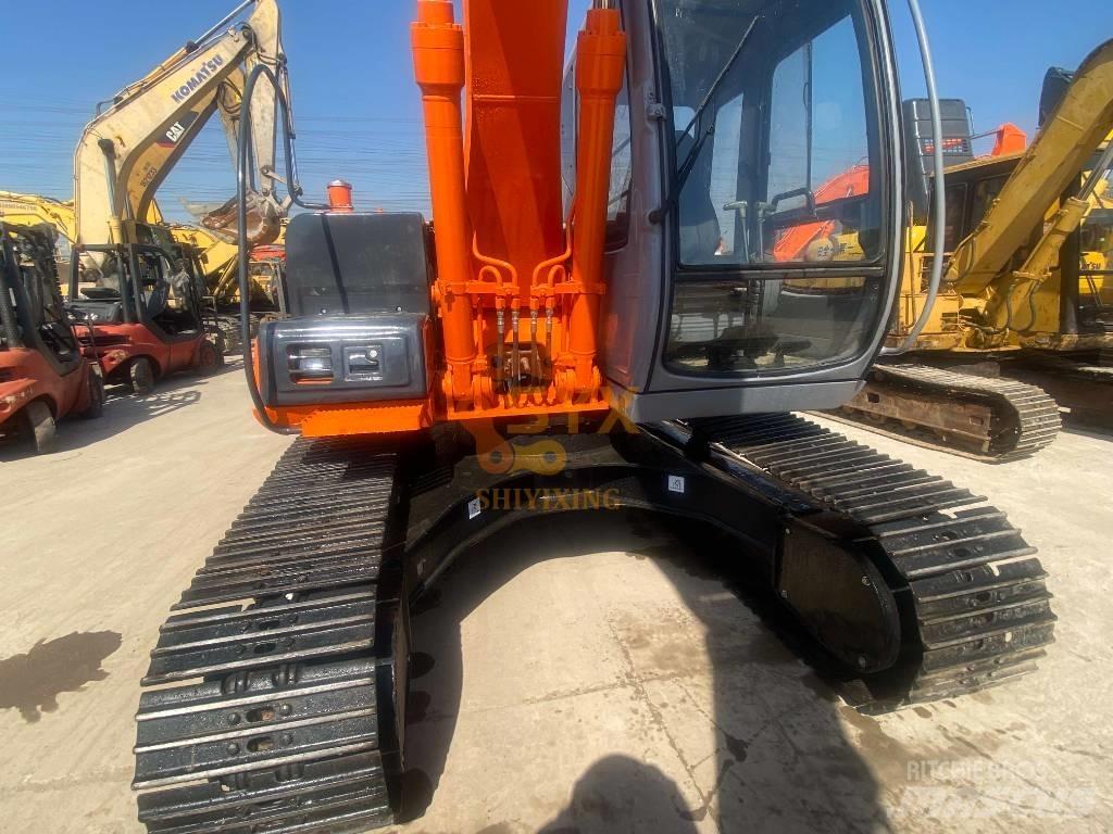 Hitachi EX 120 Gravemaskiner på larvebånd