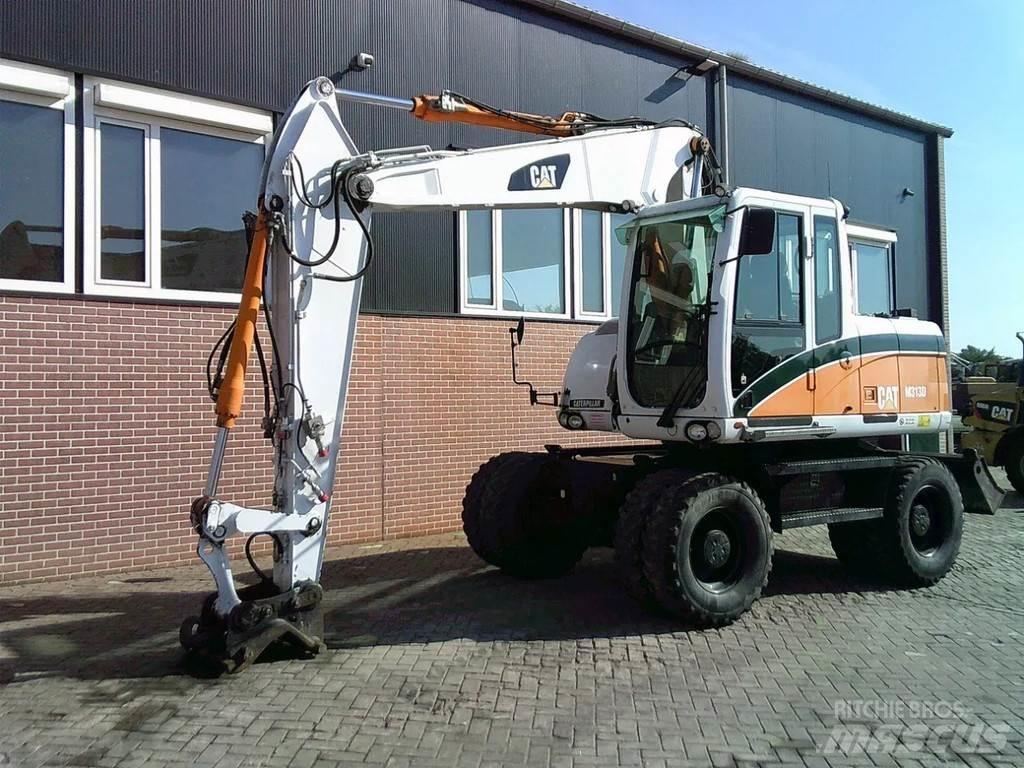 CAT M313D Gravemaskiner på hjul