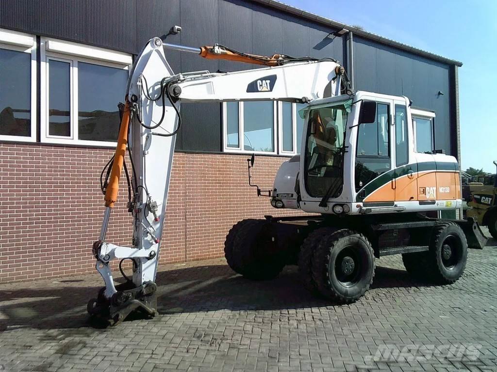 CAT M313D Gravemaskiner på hjul