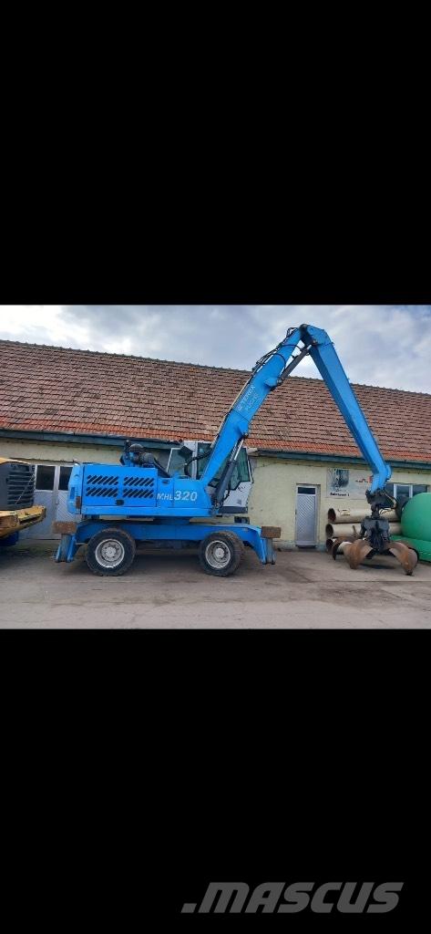 Fuchs MHL 320 Gravemaskiner på hjul