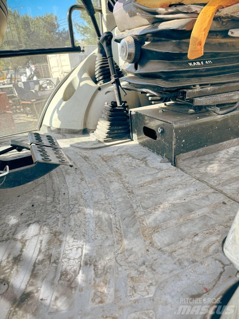 Komatsu WB 140-2N Rendegravere