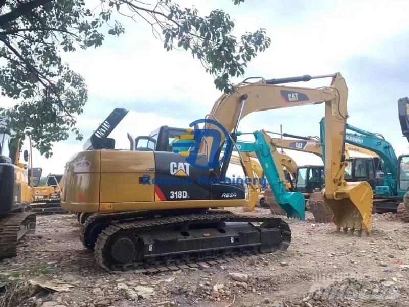 CAT 318DL Gravemaskiner på larvebånd