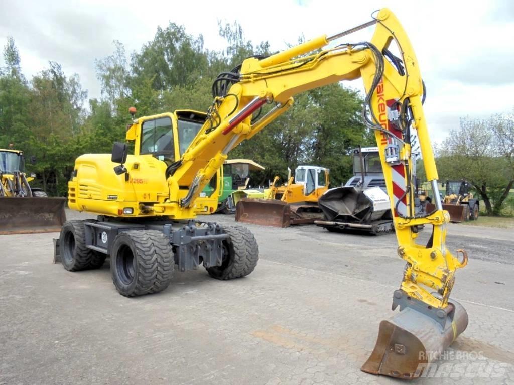 Takeuchi TB 295 W-2 Gravemaskiner på hjul