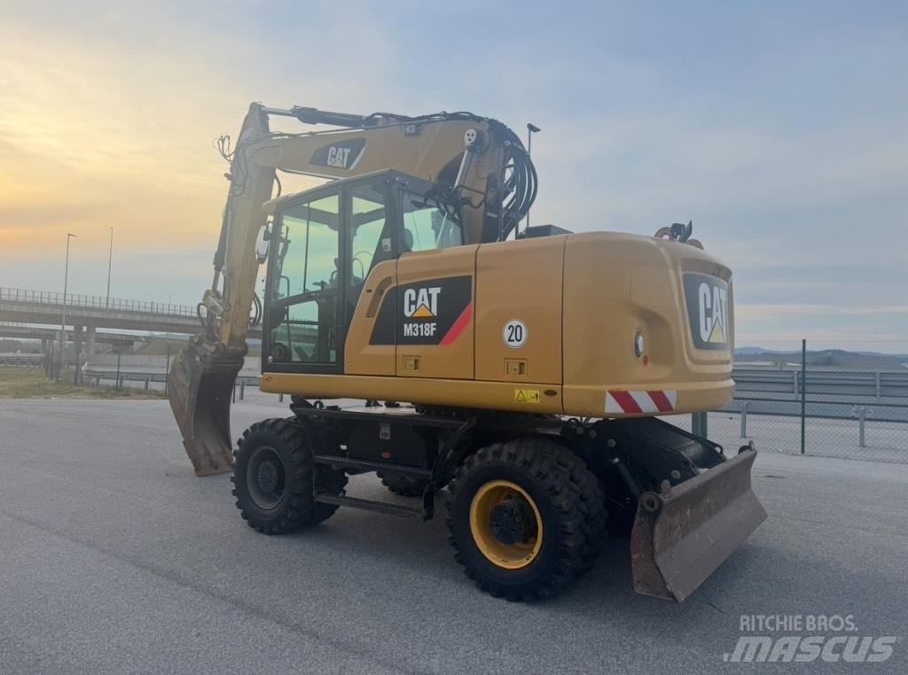 CAT M 318 F Gravemaskiner på hjul