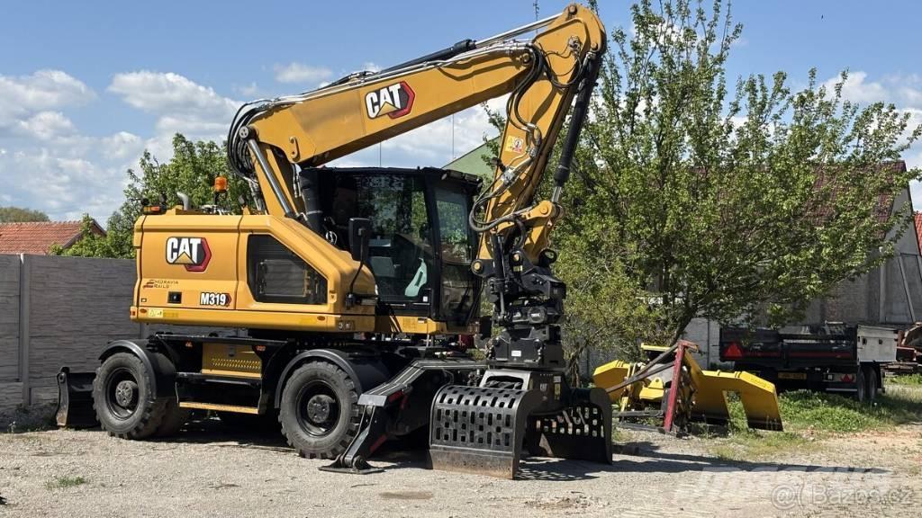 CAT M 319 Gravemaskiner på hjul
