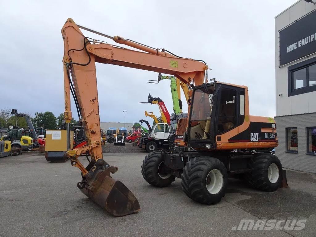 CAT M315 Gravemaskiner på hjul
