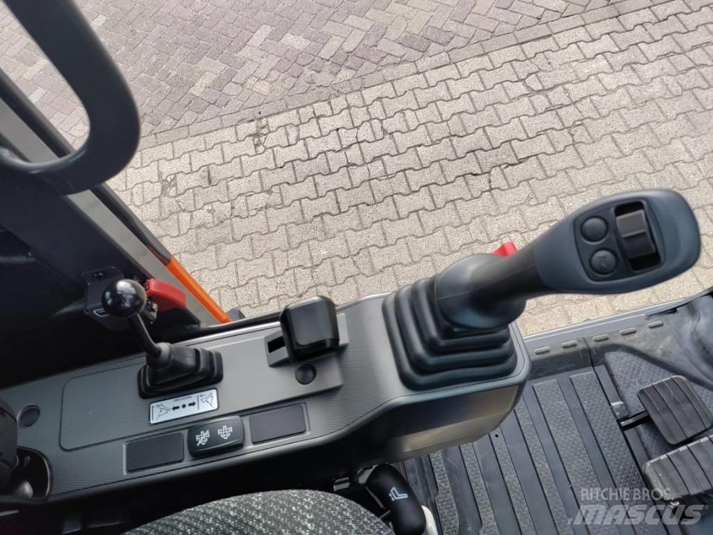 Develon DX100W-7 Gravemaskiner på hjul