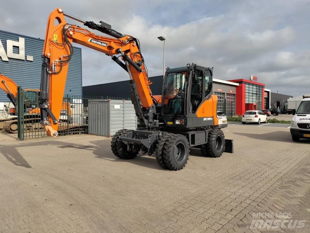 Develon DX100W-7 Gravemaskiner på hjul