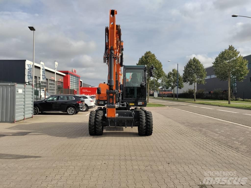 Develon DX100W-7 Gravemaskiner på hjul