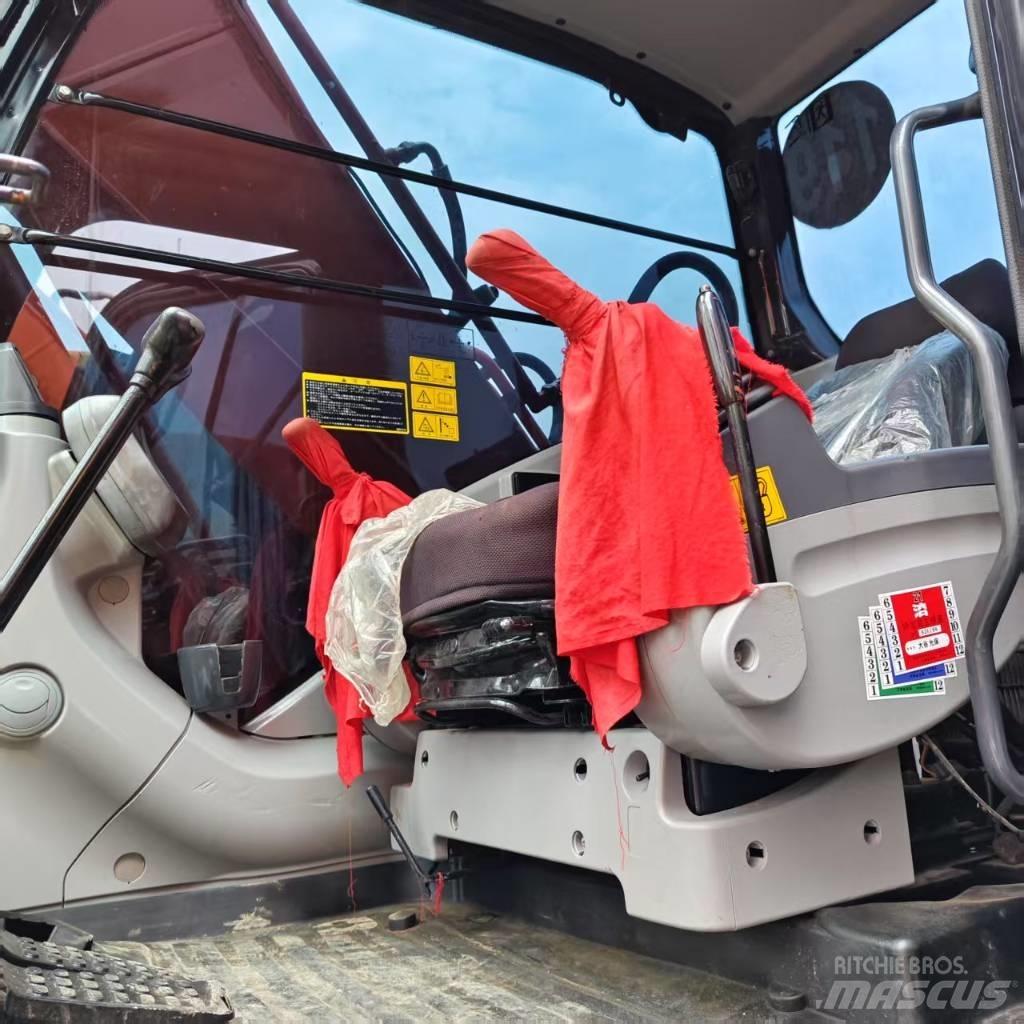 Hitachi ZX 210 Gravemaskiner på larvebånd